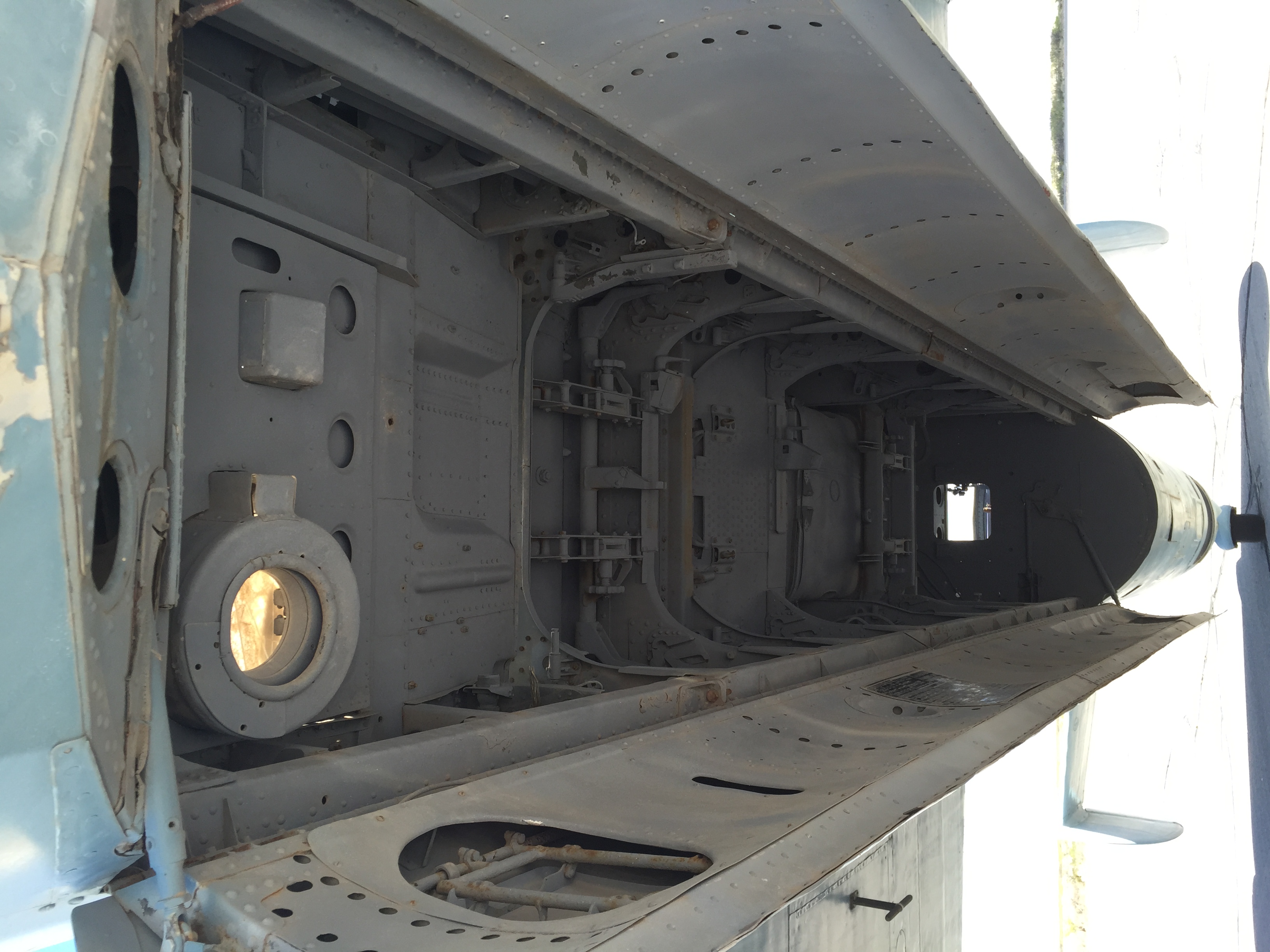 A missile chamber under an airplane.