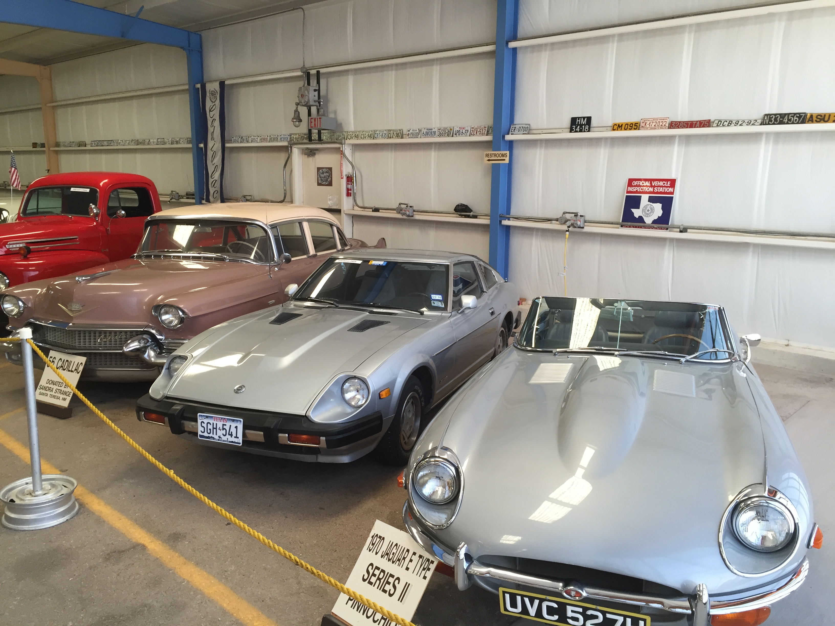 A few of the vintage cars including a 1956 Cadillac and a 1970 Jaguar E Type Series II.