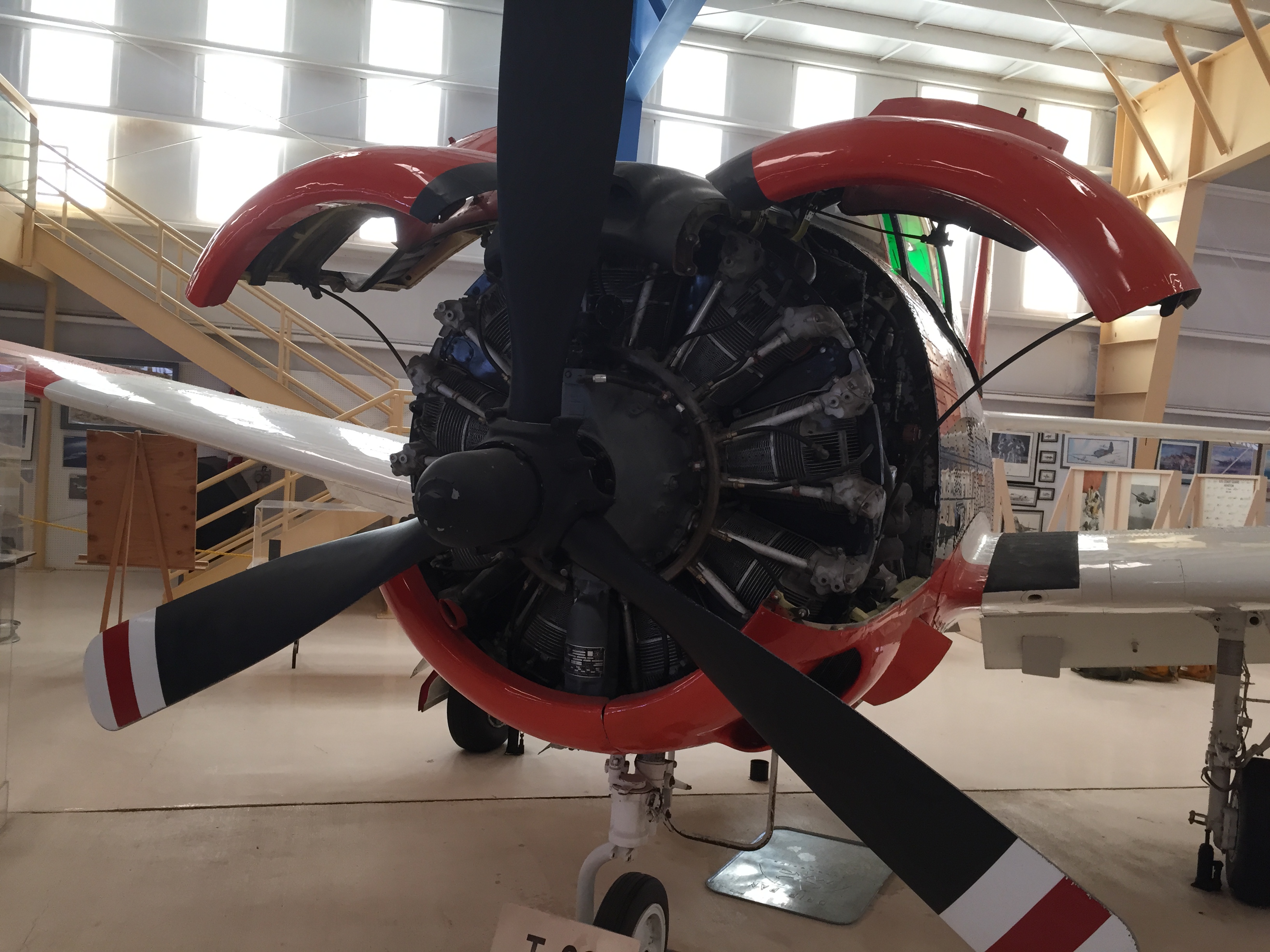 A display of an uncovered airplane engine.