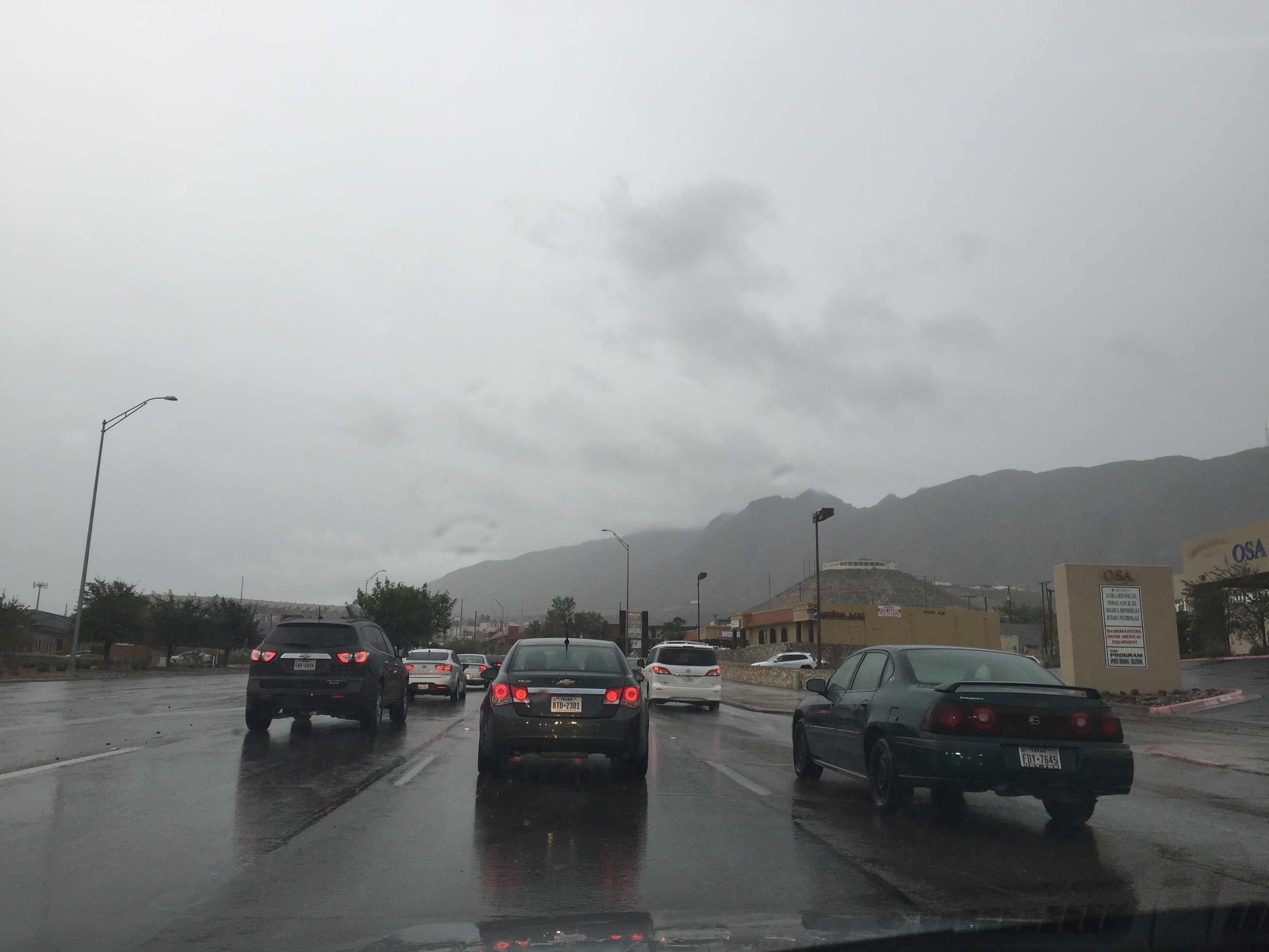 North Mesa Street, El Paso, Texas. We enjoyed the ride back home from work because it was raining: dibble dibble dibble dop.
