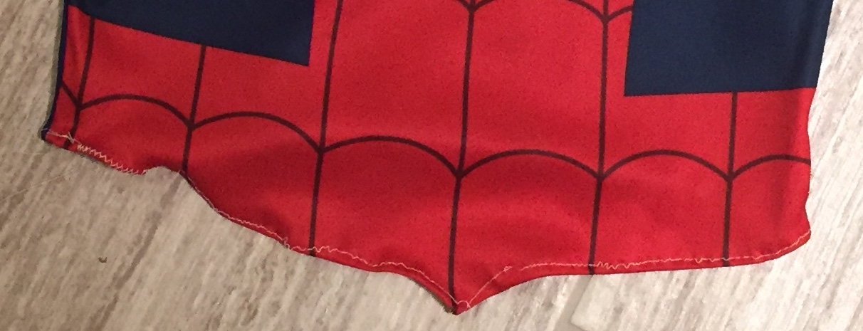 I am a novice tailor. :-( I sewed the bottom-edge of the top-part. The sewing did not end-up great but it will work. Next time, I would use red threads to hide the erroneous sewing. 