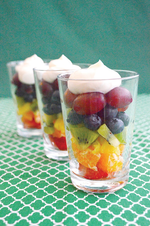 Rainbow Fruit Parfait Recipe. A fruit treat for both children and grownups. The Parfait is full of vitamins, minerals, and fibers. #Recipes #fruitrecipe #fruits #FruitParfaits